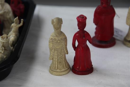 A 19th century Macau carved and stained ivory chess set, king 4.75in.